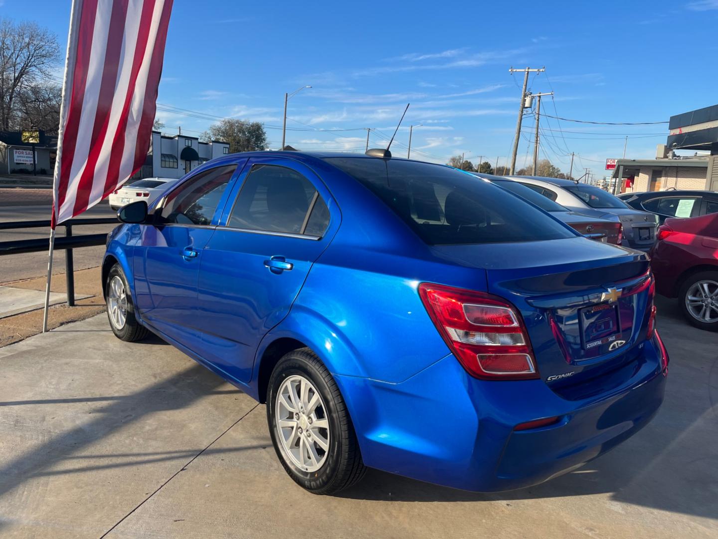 2018 BLUE CHEVROLET SONIC LT LT Manual Sedan (1G1JD5SH6J4) with an 1.8L L4 DOHC 24V engine, 5M transmission, located at 8101 E. Skelly Dr., Tulsa, OK, 74129, (918) 592-3593, 36.121891, -95.888802 - Photo#2